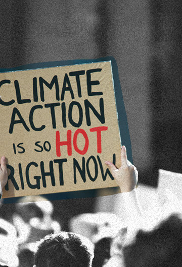 Photo of people protesting, but people's faces are turned the other way. Someone is holding up a sign that says "Climate action is so, so hot right now."