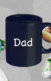 A collage of a mug that says "Dad," two shoes with little kids, a pacifier, a baby bottle, a toy rubber duck, and a stuffed animal