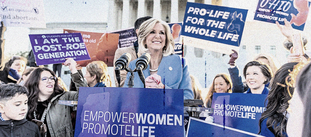 A photo from an anti-abortion protest, and mainly white women are visibly protesting with signs with messages like "Pro-Life for the whole life."